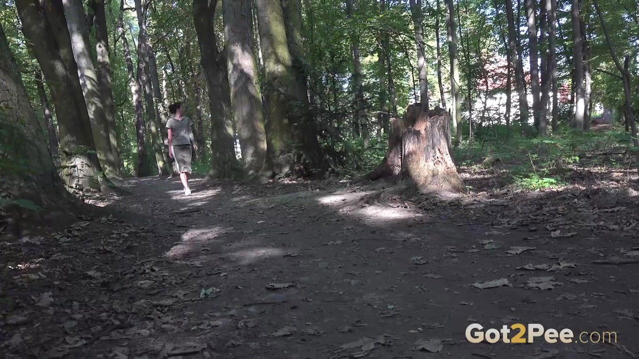 Ali Bordeaux relieves herself in the woodland