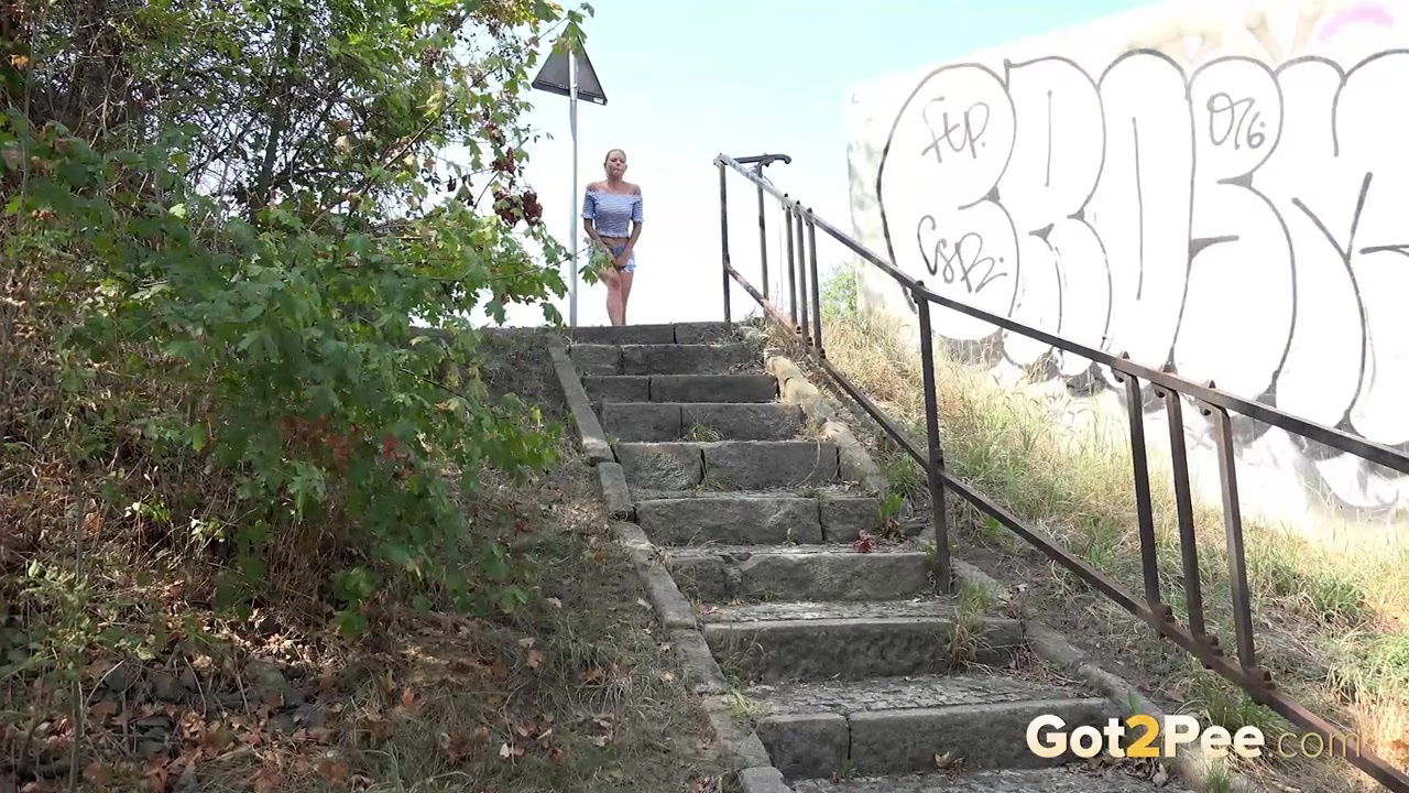 Blonde babe Julia Parker suffers pee desperation